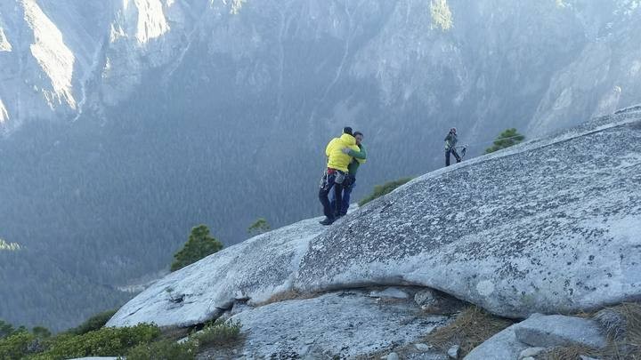 Kevin Jorgenson and partner Tommy Caldwell celebrate after completing the first free climb ascent of El Capitan's Dawn Wall in Yosemite National Park