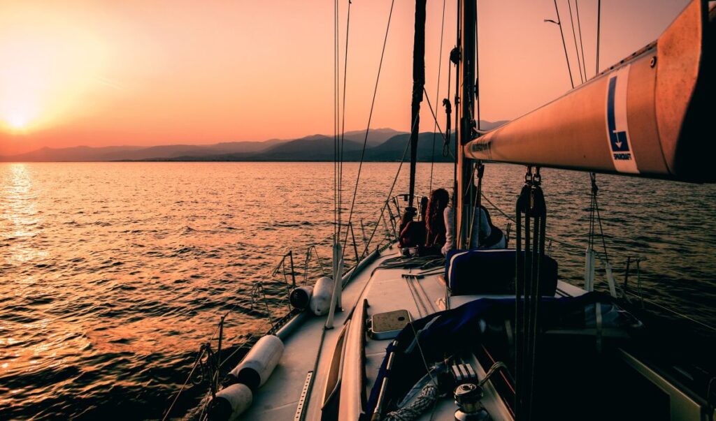 boat sunset tourism on the edge sailing